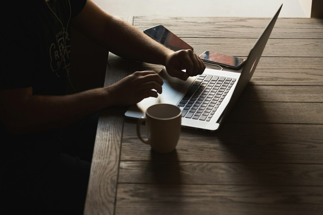 person using laptop research